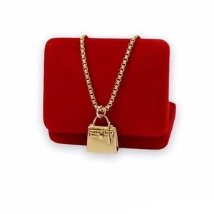Kelly Bag Gold Charm Necklace on 16 in chain